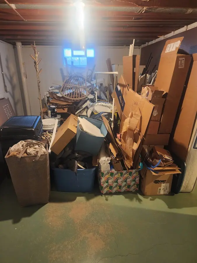 Roll-off dumpster container at job site for 2 Yard Dumpster Rental in Pocono